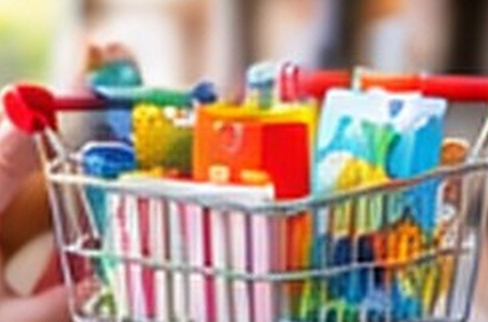 Household cleaning products in a shopping basket